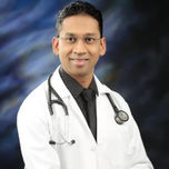 Dr. Magesh B