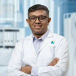 Dr Nischay B