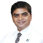 Dr. Ravishankar K S