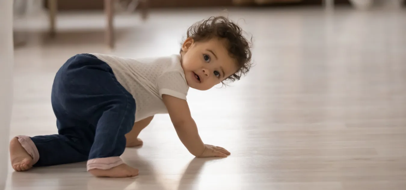 Baby crawling developmental milestone
