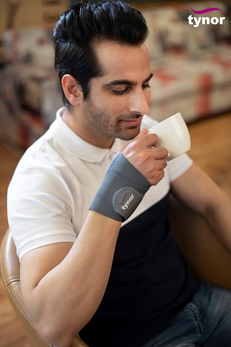 Tynor Wrist Brace with Thumb for Right/Left Wrists Universal, 1 Count, Pack of 1 Tynor Wrist Brace with Thumb for Right/Left Wrists Universal, 1 Count, Pack of 1